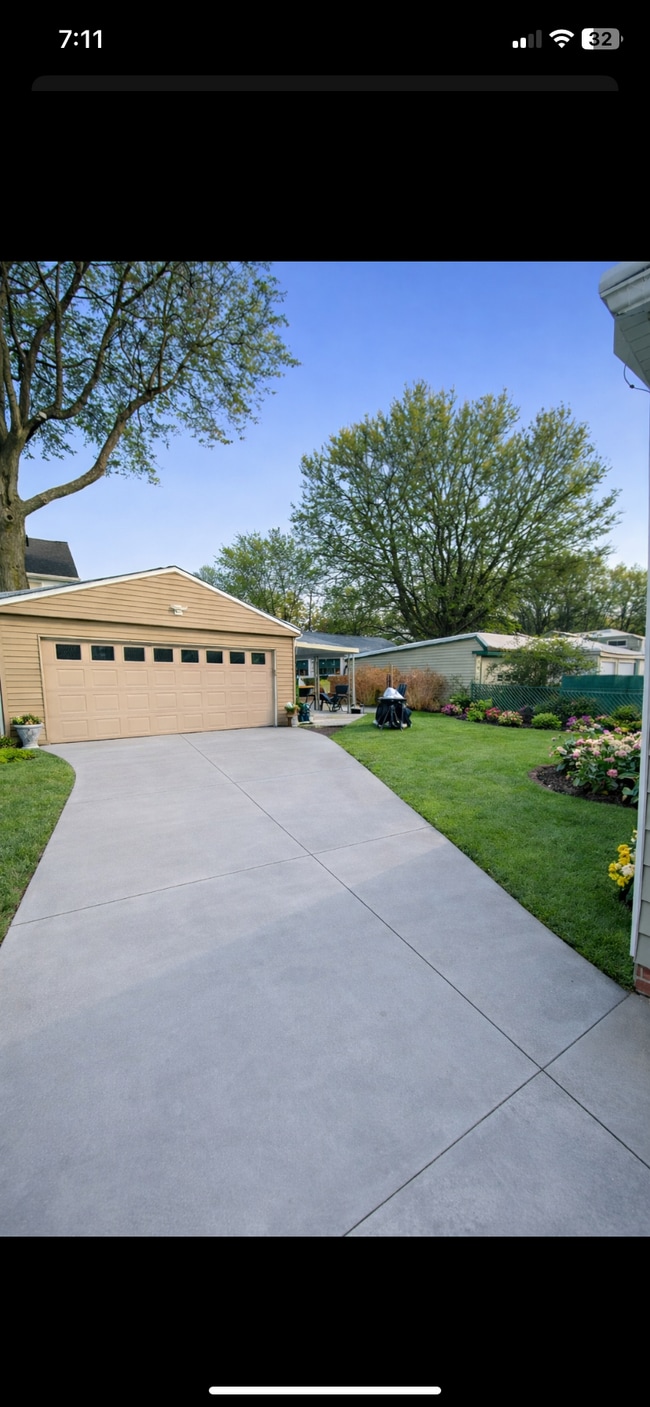 Backyard with new garage 2 car - 6363 State Rd