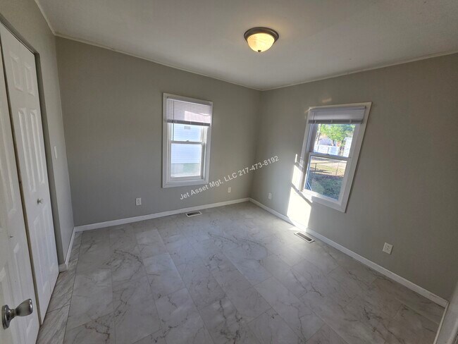 Photo - Cute 2 bedroom house with XL 2 car garage!