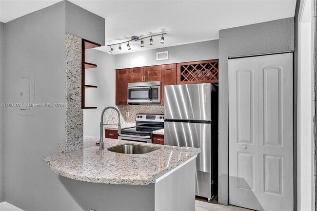 Building Photo - 2880 N Oakland Forest Dr Unit 213