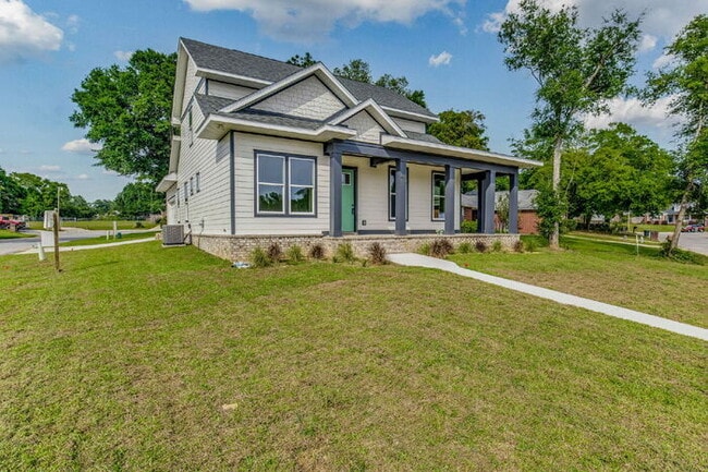 This luxurious new custom home in the sought-after Shadow Grove subdivision is a masterpiece of m...
