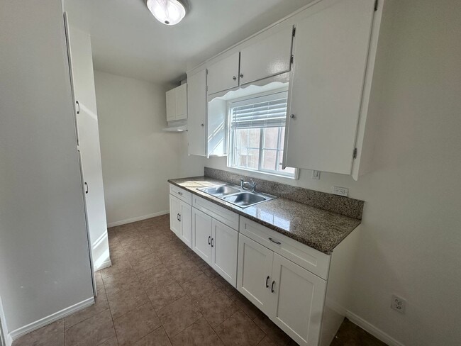 Building Photo - 8739-8743 Firestone Blvd Unit 8741 1/2