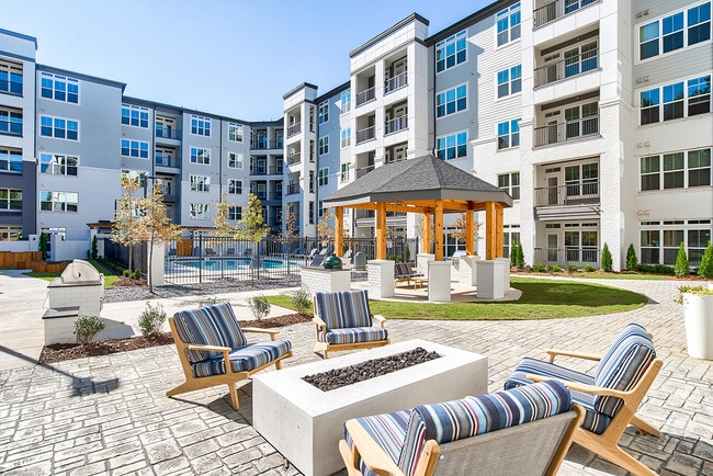 Fire Pit and Outdoor TV Pavilion - Evoq Johns Creek Apartments