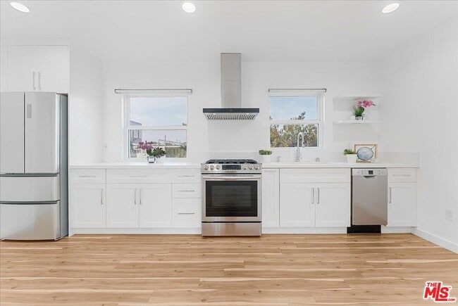 Building Photo - 2948 Exposition Blvd Unit 8