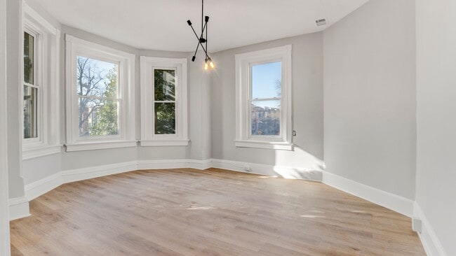 Photo - Spacious 4-Bedroom, 2-Bathroom Apartment i... Unit 2