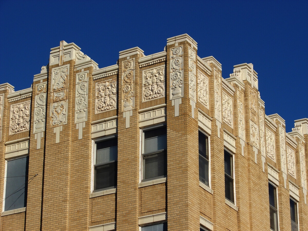 Detail of the facade above the top floor - Equity Plaza Apartments