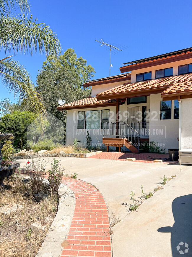 Building Photo - 6489 Rainbow Heights Rd Rental