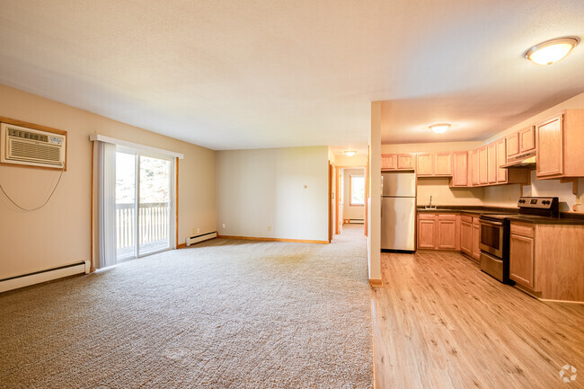 Aspen Village - 2BR, 1BA – 900SF - Living Room and Kitchen - Aspen Village Rental