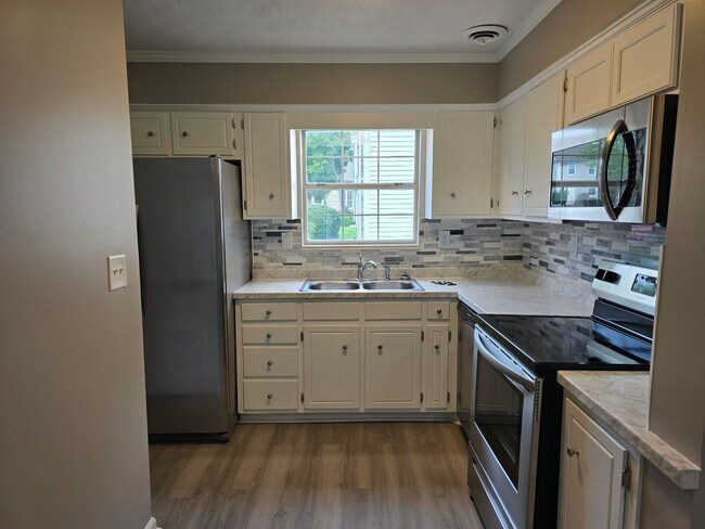 Photo - 1/2 OFF 1st Month's Rent