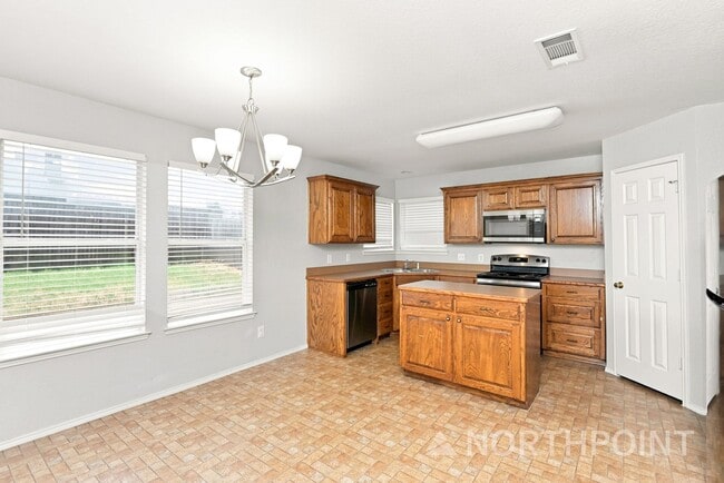 Photo - 4BR/2BA | Updated Single Family Home | 2-Car Garage Parking | Private  backyard
