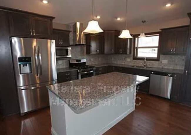Photo - Beautiful 4 bed, 3 bath single-family home with attached 3-car garage in quiet residential neighb...