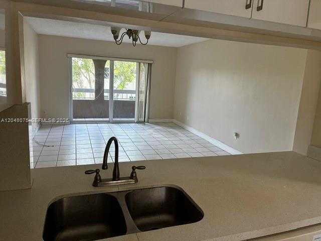 Building Photo - 7830 Camino Real Unit K310
