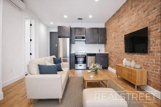 Photo - Modern & Bright 2BR with Rooftop Deck, Central A/C & Dishwasher | Bed-Stuy/Bushwick Border Unit 4B