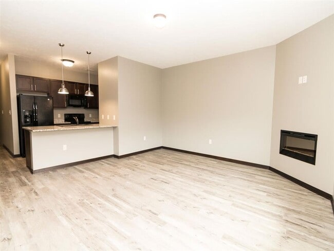 Our spacious living rooms are perfect for relaxing by the cozy fireplace, creating a warm and inviting space for everyday living.