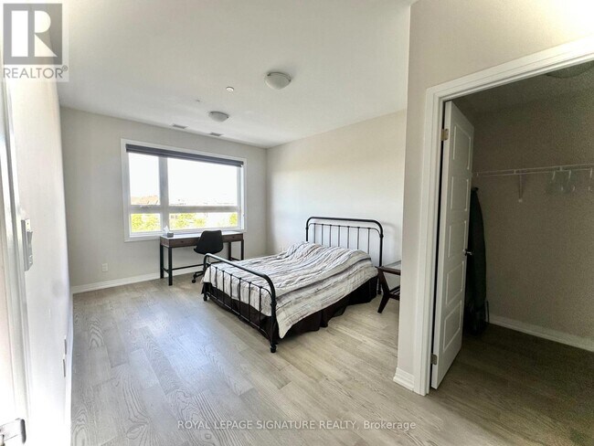 Photo - 3265 Carding Mill Trail Unité 206