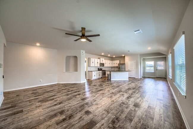 Photo - Welcome to this beautifully maintained 4-bedroom, 2-bathroom home in the highly desirable Whisper...