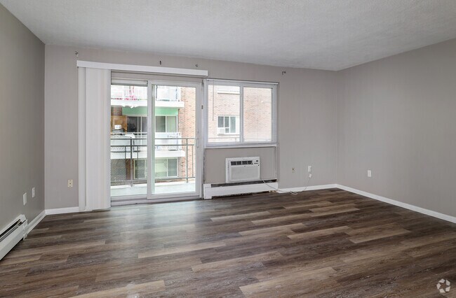 2BR, 1BA - 850SF - Living Room - Malom Trust Apartments