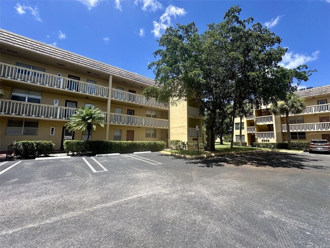 Building Photo - 5980 NW 64th Ave Unit 112