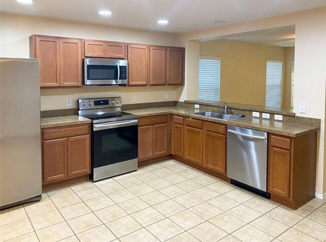 Photo - 3 BR/2.5BA | Newly Renovated Single Family Home | Private Rear Patio | Community Pool | In Compas...