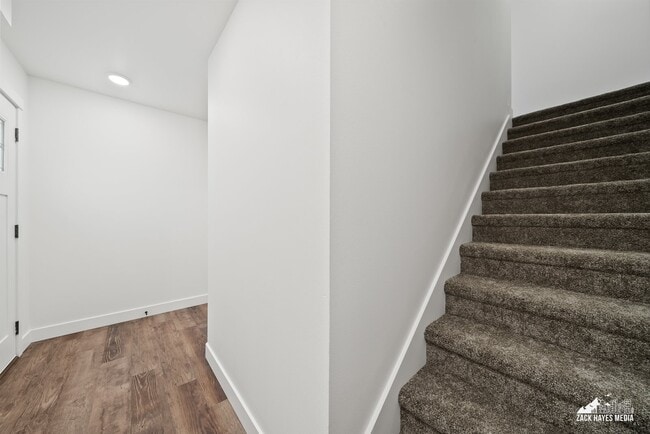 Entry and stairs to main living area - 1493 W 40th Ave Unit #1493