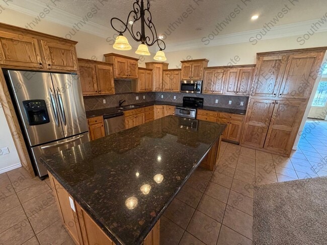 Photo - Stunning 4 bedroom 3 bath brick home with 5 car garage!
