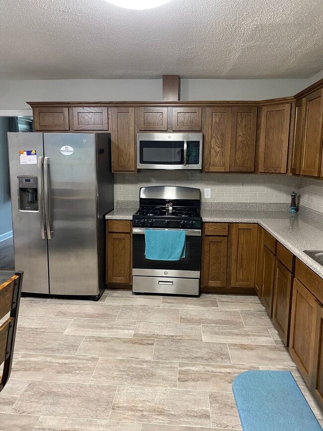 Photo - Spacious 3BR/2BA with Open Layout and Large Backyard