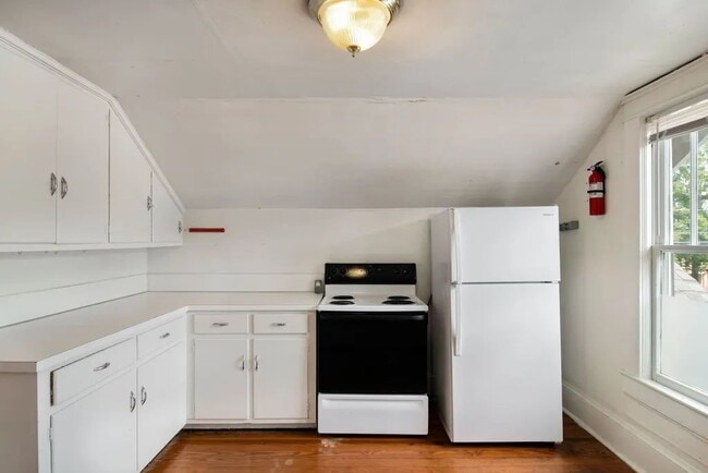 Photo - "Historic 2-Bed Apartment with Gleaming Hardwood Floors in Prime Durham Location!" Unit Apt C