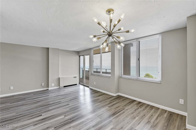 Building Photo - 12900 Lake Ave Unit 828