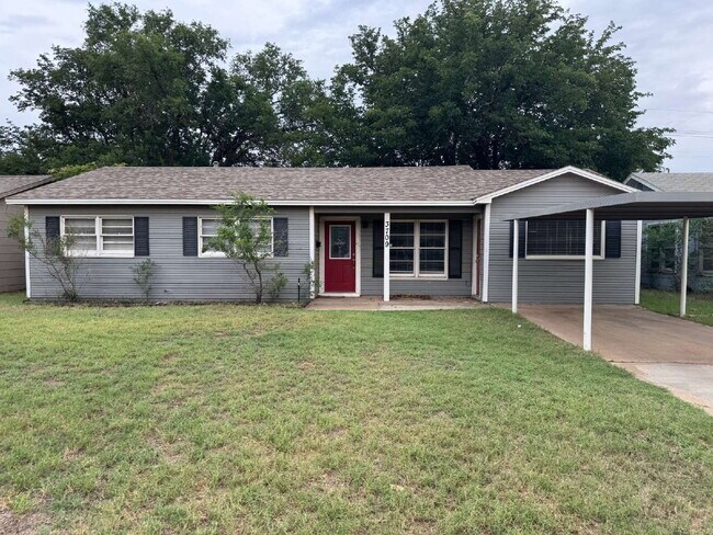 Building Photo - "4 bedroom 2 bath with a carport and HUGE backyard