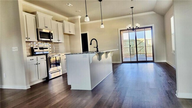 Photo - Modern 3-Bed, 2-Bath Home with Fenced Yard