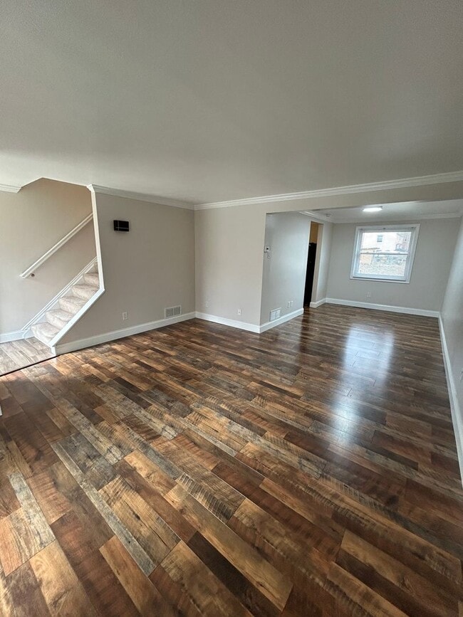 Photo - Modern Charm: 2 BR Home with Finished Basement, Pet Friendly, Assigned Parking, and Prime Location!