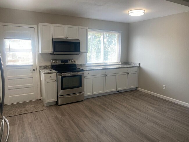 Photo - Updated 4 bedroom, 2 bath! Available 7/10/26!