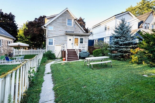 Back of house - 2211 E Holt Ave Unit 2211A