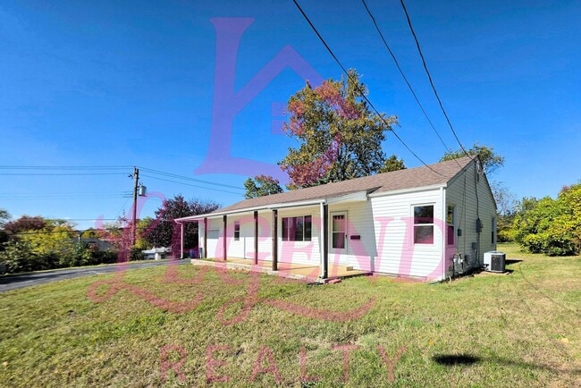 Photo - Charming 3-Bedroom with Huge Yard & Covered Patio