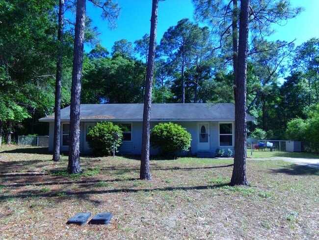 Photo - 2BR/1BA Milton Duplex with Huge Fenced Backyard, Tile Flooring Throughout & Convenient Access to ...