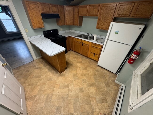 115 E 4th St