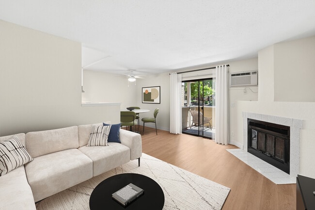 Renovated Package I living and dining area with hard surface flooring