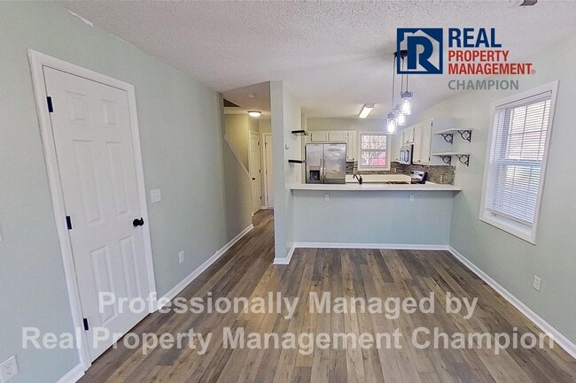 Photo - Recently updated 2 BD/1.5 BA End Unit Townhome w/Community Pool
