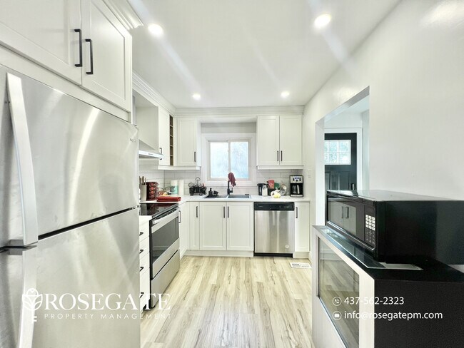 Photo - Charming 3-Bedroom Detached Home with Balc... Unit 1
