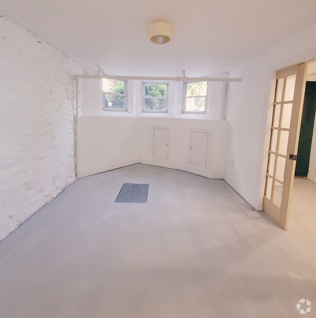 Building Photo - 6134 Linden St Unit Modern 2BR Semi-Basement Rental
