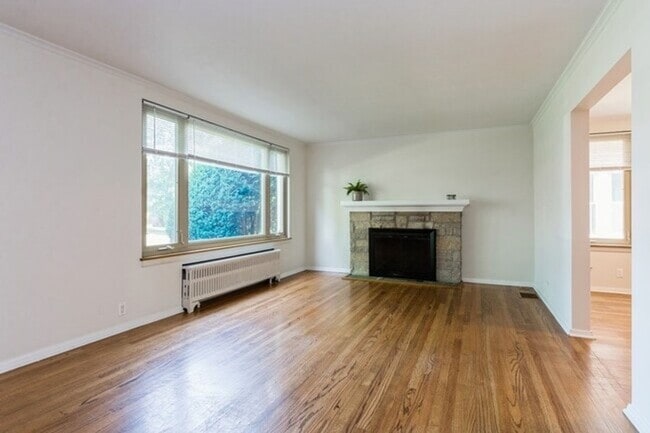 Photo - Spacious 2 Bedroom on Quiet Street featuring Central Air, Fireplace, Dishwasher, Private Screened...
