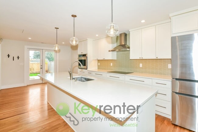 Photo - Stylish Four Bedroom Home with Hardwood Floors and Outdoor Space