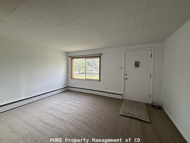 Photo - Cozy single family home with 1-car detached garage!
