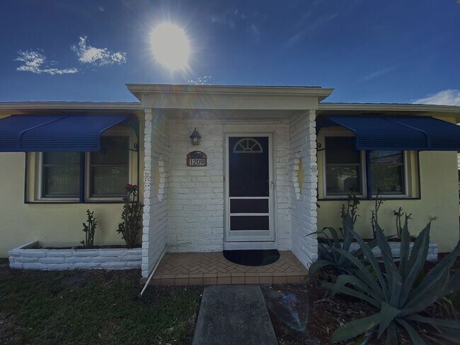 Photo - 2/2 single family house with big yard near downtown and beach!