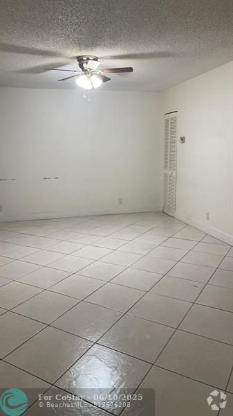 Building Photo - 12141 Royal Palm Blvd Unit 7E Rental