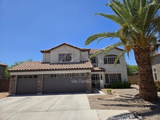 Building Photo - 1005 E Stirrup Ln