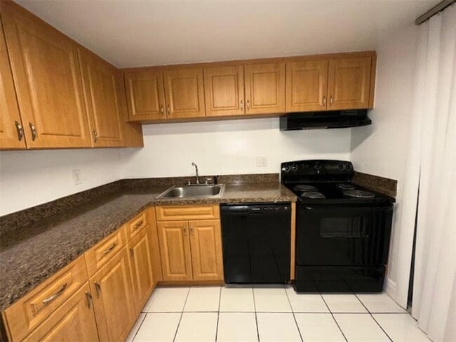 Building Photo - 10027 Winding Lake Rd Unit 102 Rental