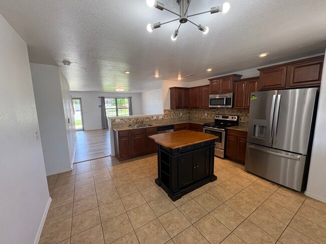 Kitchen and downstairs living area