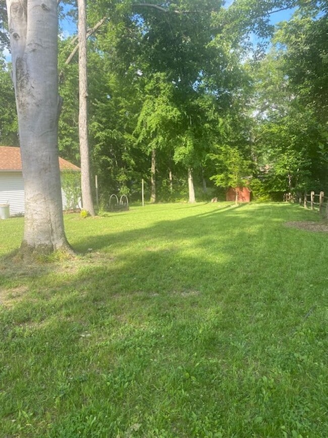Photo - Ranch home with two car garage located on over 1/2 acre