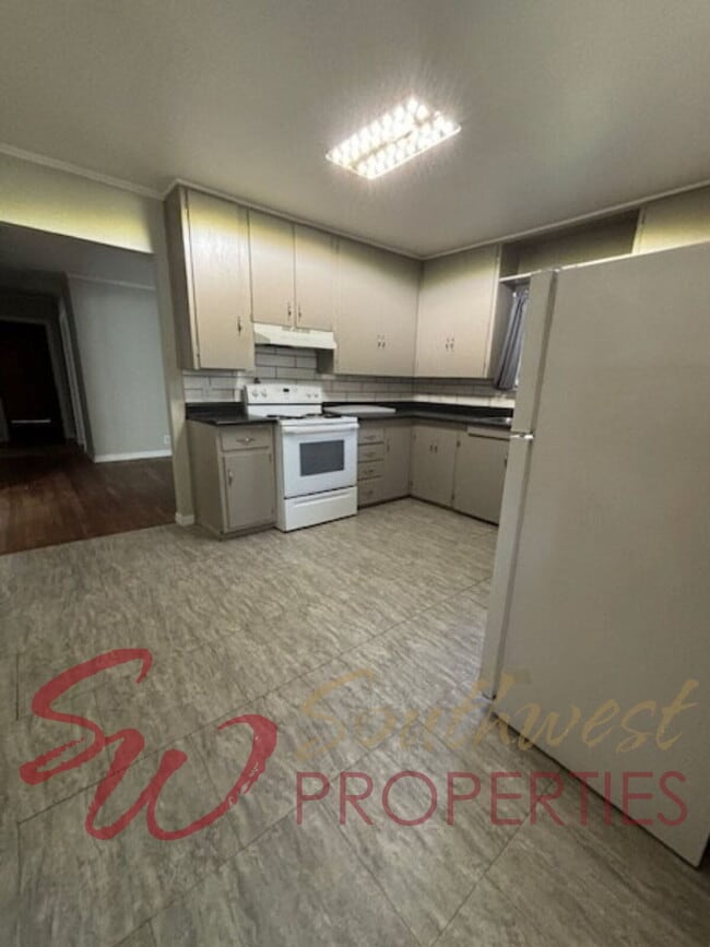 Photo - Spacious 4 Bedroom Home with Park-Like Backyard!