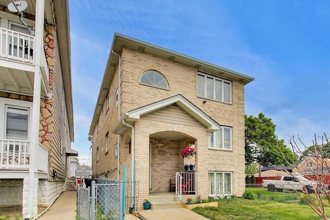 Photo - 7520 W 61st St Unit 2